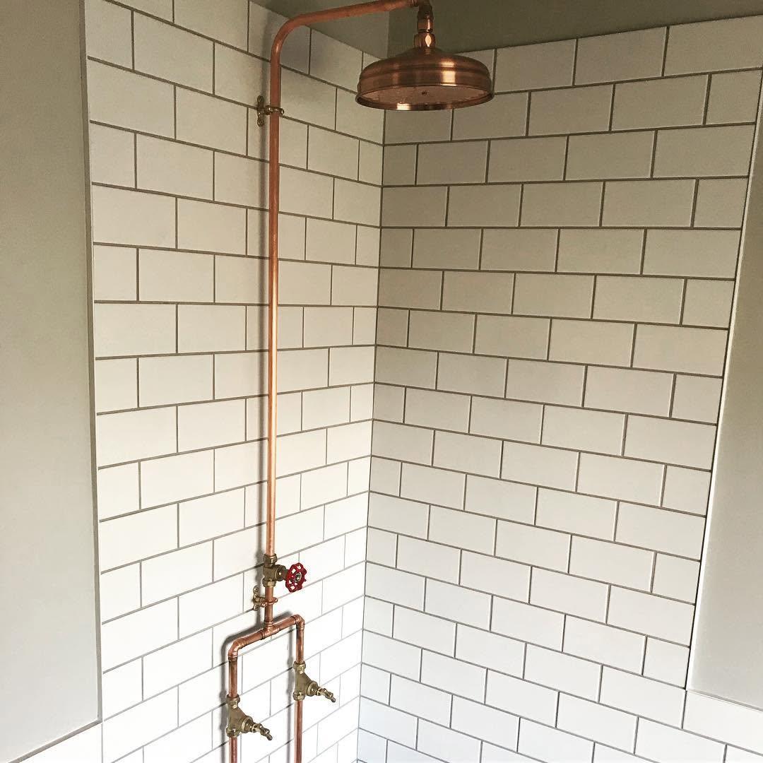 Bespoke bathroom detail showing quality tile work and fixtures