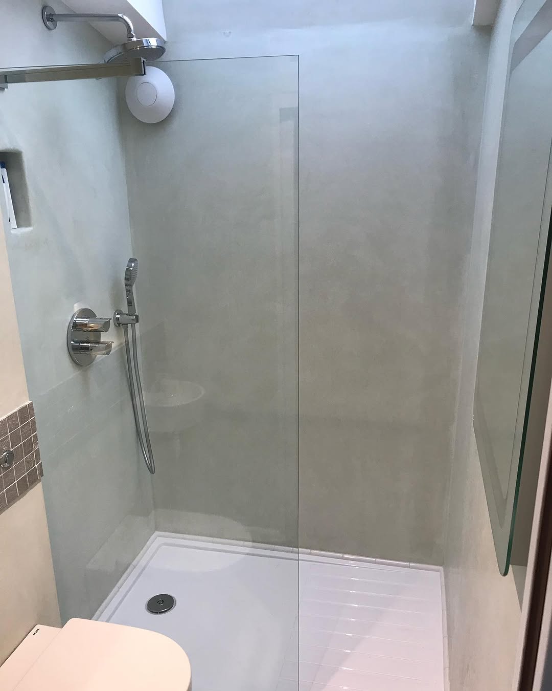 Microcement shower room with bespoke washbasin in Brighton